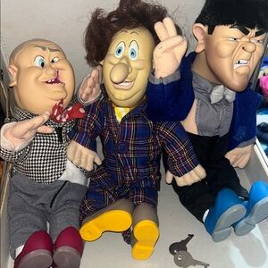 Vintage The Three Stooges dolls with locking case